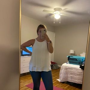 White sleeveless blouse